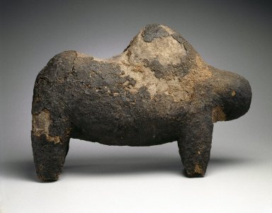 Bamana. <em>Boli Figure, for the Kono Society</em>, late 19th-early 20th century. Clay and organic materials, 15 x 7 x 21 1/2 in. (38.1 x 17.8 x 54.6 cm). Brooklyn Museum, Gift of Georges Rodrigues, 75.77. Creative Commons-BY (Photo: Brooklyn Museum, 75.77_SL1.jpg)