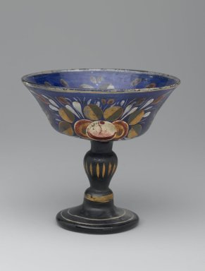  <em>Painted Stemmed Cup</em>, late 19th century. Translucent deep blue glass; free blown and enameled; tooled on the pontil, 4 7/8 x 5 in. (12.4 x 12.7 cm). Brooklyn Museum, Designated Purchase Fund, 76.11. Creative Commons-BY (Photo: Brooklyn Museum, 76.11_side1_PS2.jpg)