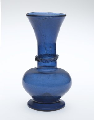  <em>Vase</em>, 18th century. Translucent deep blue glass; free blown and applied; tooled on the pontil, 5 5/8 x 2 3/8 in. (14.3 x 6 cm). Brooklyn Museum, Gift of Mr. and Mrs. Charles K. Wilkinson in honor of Irma L. Fraad, 76.147.1. Creative Commons-BY (Photo: Brooklyn Museum, 76.147.1_PS2.jpg)