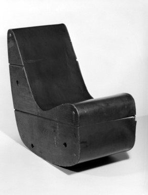 Frederick J Kiesler (Czernowitz, Austro–Hungarian Empire (present–day Ukraine), 1890–1965, New York, New York). <em>Correalist Rocker</em>, ca. 1942. Plywood, linoleum, 29 1/8 x 30 1/2 x 15 5/8 in.  (74.0 x 77.5 x 39.7 cm). Brooklyn Museum, Gift of Ruth Abrams, 76.169. Creative Commons-BY (Photo: Brooklyn Museum, 76.169_bw.jpg)