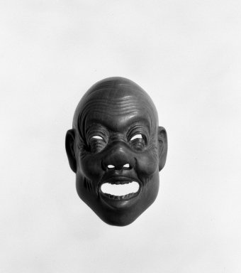 <em>Netsuke in the form of a Mask</em>, early 20th century. Boxwood, 1 3/8 x 1 3/4 in. (3.5 x 4.5 cm). Brooklyn Museum, Hon. and Mrs. Leon Polsky
, 76.184.2. Creative Commons-BY (Photo: Brooklyn Museum, 76.184.2_bw.jpg)