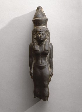  <em>The Goddess Mut</em>, ca. 664–525 B.C.E. Schist, 6 3/8 x 1 1/2 x 1 7/8 in. (16.2 x 3.8 x 4.8 cm). Brooklyn Museum, Charles Edwin Wilbour Fund, 76.38. Creative Commons-BY (Photo: Brooklyn Museum, 76.38_view1_SL1.jpg)