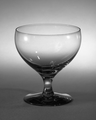 Russel Wright (American, 1904-1976). <em>Drinking Glass</em>, ca. 1940. Transparent glass, 3 1/4 x 2 7/8 in. (8.3 x 7.3 cm). Brooklyn Museum, Gift of Russel Wright, 76.99.10. Creative Commons-BY (Photo: Brooklyn Museum, 76.99.10_bw.jpg)