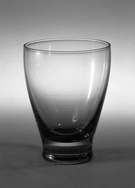 Russel Wright (American, 1904-1976). <em>Glass</em>, ca. 1940. Transparent glass, 3 3/4 x 1 5/8 x 2 11/16 in. (9.5 x 4.1 x 6.8 cm). Brooklyn Museum, Gift of Russel Wright, 76.99.11. Creative Commons-BY (Photo: Brooklyn Museum, 76.99.11_bw.jpg)
