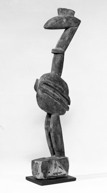 Senufo. <em>Figure of a Bird</em>, late 19th or early 20th century. Wood, 15 1/4 x 2 x 4 in. (38.7 x 5.1 x 10.2 cm). Brooklyn Museum, Gift of Mr. and Mrs. J. Gordon Douglas III to the Jennie Simpson Educational Collection of African Art, 77.173.6. Creative Commons-BY (Photo: Brooklyn Museum, 77.173.6_bw.jpg)