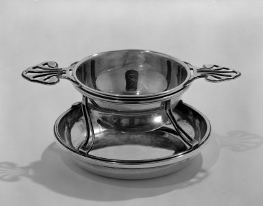 Keller Frères (1856 - 1947). <em>Tea Strainer and Stand</em>, ca. 1900. Silver, 3 x 4 5/8 in. (7.6 x 11.7 cm). Brooklyn Museum, Gift of Margaret Liebman Berger and Charles J. Liebman, Jr. in memory of Aline and Charles J. Liebman, 77.188.8a-b. Creative Commons-BY (Photo: Brooklyn Museum, 77.188.8a-b_bw.jpg)