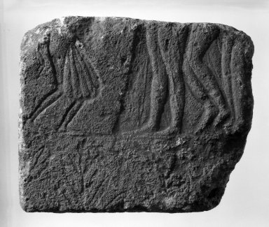  <em>Fragmentary Relief</em>, ca. 1400 B.C.E. Limestone, 9 1/4 x 11 1/4 x 2 5/16 in. (23.5 x 28.5 x 5.8 cm). Brooklyn Museum, Gift of Frederica Tchacos, 77.192. Creative Commons-BY (Photo: Brooklyn Museum, 77.192_negA_bw_IMLS.jpg)