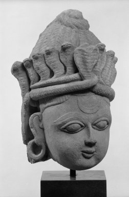  <em>Head with Serpent Crown</em>. Sandstone, 9 3/4 x 7 5/8 in. (24.8 x 19.4 cm). Brooklyn Museum, Gift of Emily Manheim Goldman, 77.259.2. Creative Commons-BY (Photo: Brooklyn Museum, 77.259.2_bw.jpg)