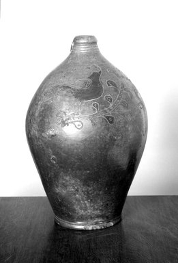 American. <em>Jug</em>, 1790–1810. Earthenware, 14 1/2 x 9 7/8 x 9 3/4 in. (36.8 x 25.1 x 24.8 cm). Brooklyn Museum, Gift of Allison C. Paulsen in memory of Arthur W. Clement, 77.45.1. Creative Commons-BY (Photo: Brooklyn Museum, 77.45.1_bw.jpg)