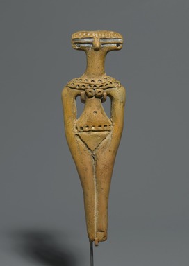  <em>Schematic Female Figurine</em>, ca. 1630–1539 B.C.E. Clay, pigment, 4 3/4 x 1 7/16 x 9/16 in. (12 x 3.7 x 1.5 cm). Brooklyn Museum, Charles Edwin Wilbour Fund, 77.49. Creative Commons-BY (Photo: Brooklyn Museum, 77.49_PS2.jpg)