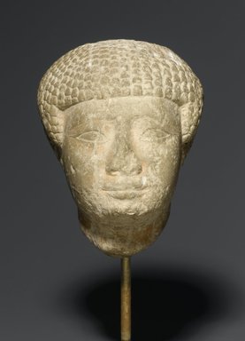  <em>Head in Short Wig</em>, ca. 1938–1875 B.C.E. Limestone, 4 1/2 x 3 x 3 1/2 in. (11.4 x 7.6 x 8.9 cm). Brooklyn Museum, Charles Edwin Wilbour Fund, 77.6. Creative Commons-BY (Photo: Brooklyn Museum, 77.6_PS2.jpg)