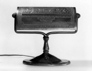 Tiffany Studios (1902–1932). <em>Lamp</em>, 1906–1938. Bronze, glass, 9 1/4 x 11 1/4 x 4 7/8 in. (23.5 x 28.6 x 12.4 cm). Brooklyn Museum, Bequest of Carl Otto von Kienbusch, 77.86.2. Creative Commons-BY (Photo: Brooklyn Museum, 77.86.2_bw.jpg)