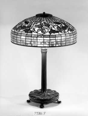 Tiffany Studios (1902–1932). <em>Table Lamp</em>, ca. 1906–1938. Bronze, glass, and lead, Overall: 26 x 18 1/8 x 18 1/8 in. (66 x 46 x 46 cm). Brooklyn Museum, Bequest of Carl Otto von Kienbusch, 77.86.7. Creative Commons-BY (Photo: Brooklyn Museum, 77.86.7_bw.jpg)