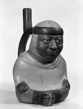 Moche. <em>Stirrup Spout Vessel in Form of Seated Figure</em>. Ceramic, pigment Brooklyn Museum, Gift of Mr. and Mrs. Paul B. Taylor, 78.118.42. Creative Commons-BY (Photo: Brooklyn Museum, 78.118.42_bw.jpg)