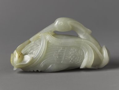  <em>Carving of a Recumbent Heron and Lotus</em>, late 18th-early 19th century. Nephrite, 2 5/8 x 3 1/2 x 2 in. (6.7 x 8.9 x 5.1 cm). Brooklyn Museum, Gift of Stanley Herzman, 78.85.3a-b. Creative Commons-BY (Photo: Brooklyn Museum, 78.85.3a-b_front_PS4.jpg)