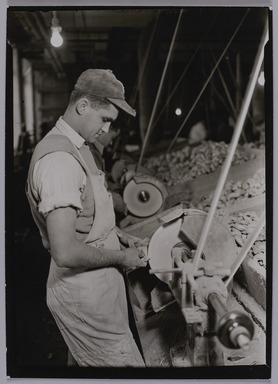 Lewis Wickes Hine (American, 1874-1940). <em>[Untitled]  (Young Man at Lathe)</em>, 1936-1937. Gelatin silver print, 7 x 5 in.  (17.8 x 12.7 cm). Brooklyn Museum, Gift of The National Archives, 79.143.28 (Photo: Brooklyn Museum, 79.143.28_PS20.jpg)