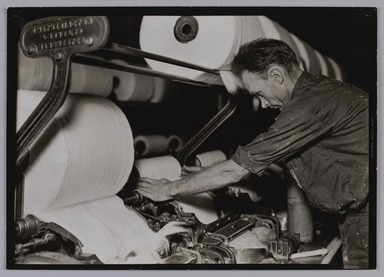 Lewis Wickes Hine (American, 1874-1940). <em>[Untitled] (Man and Fiber Reels)</em>, 1936-1937. Gelatin silver print, 4 3/4 x 7 1/4 in.  (12.1 x 18.4 cm). Brooklyn Museum, Gift of the National Archives, 79.143.60 (Photo: Brooklyn Museum, 79.143.60_PS20.jpg)