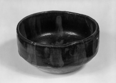  <em>Water Jar (Yu)</em>, 1271-1368. Henan ware iron - glaze
Porcelain with black glaze., 2 1/8 x 4 in. (5.4 x 10.1 cm). Brooklyn Museum, Gift of Dr. Martin E. Frankel, 79.257.1. Creative Commons-BY (Photo: Brooklyn Museum, 79.257.1_bw.jpg)