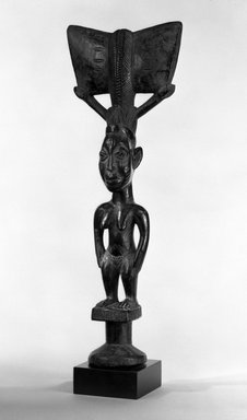 Yorùbá (Igbomina subgroup). <em>Dance Wand (Oshe Shango)</em>, late 19th or early 20th century. Wood, pigment, 19 1/2 x 7 x 3 1/4 in. (49.5 x 17.8 x 8.3 cm). Brooklyn Museum, Frank L. Babbott Fund and Designated Purchase Fund, 79.27. Creative Commons-BY (Photo: Brooklyn Museum, 79.27_bw.jpg)