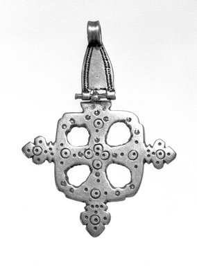 Amhara. <em>Pendant Cross</em>, 19th or 20th century. Silver, 2 3/4 x 2 in. (7.0 x 5.1 cm). Brooklyn Museum, Gift of George V. Corinaldi Jr., 79.72.19. Creative Commons-BY (Photo: Brooklyn Museum, 79.72.19_view1_bw.jpg)