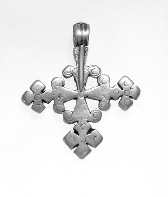 Amhara. <em>Pendant Cross</em>, 19th or 20th century. Silver, 1 7/8 x 1 5/8 in. (4.8 x 4.2 cm). Brooklyn Museum, Gift of George V. Corinaldi Jr., 79.72.20. Creative Commons-BY (Photo: Brooklyn Museum, 79.72.20_bw.jpg)