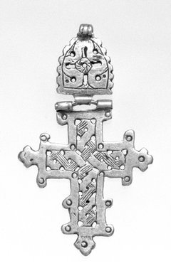 Amhara. <em>Pendant Cross</em>, 19th or 20th century. Silver, 2 5/8 x 1 5/8 in. (6.7 x 4.2 cm). Brooklyn Museum, Gift of George V. Corinaldi Jr., 79.72.21. Creative Commons-BY (Photo: Brooklyn Museum, 79.72.21_bw.jpg)