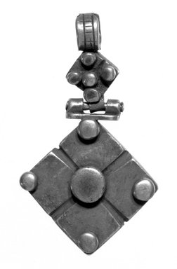 Amhara. <em>Pendant Cross</em>, 19th or 20th century. Silver, 2 1/2 x 1 3/8 in. (6.3 x 3.5 cm). Brooklyn Museum, Gift of George V. Corinaldi Jr., 79.72.25. Creative Commons-BY (Photo: Brooklyn Museum, 79.72.25_bw.jpg)