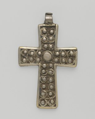 Amhara. <em>Pendant Cross</em>, 19th or 20th century. Silver, 2 1/4 x 1 3/8 in. (5.7 x 3.5 cm). Brooklyn Museum, Gift of George V. Corinaldi Jr., 79.72.27. Creative Commons-BY (Photo: Brooklyn Museum, 79.72.27_front_PS6.jpg)