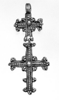 Amhara. <em>Pendant Cross</em>, 19th or 20th century. Silver, 3 1/8 x 1 1/2 in. (8.5 x 3.9 cm). Brooklyn Museum, Gift of George V. Corinaldi Jr., 79.72.29. Creative Commons-BY (Photo: Brooklyn Museum, 79.72.29_bw.jpg)