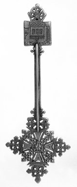 Amhara. <em>Hand Cross (mäsqäl)</em>, 19th or 20th century. Silver, 7 1/4 x 2 5/8 in. (18.3 x 6.7 cm). Brooklyn Museum, Gift of George V. Corinaldi Jr., 79.72.31. Creative Commons-BY (Photo: Brooklyn Museum, 79.72.31_bw.jpg)