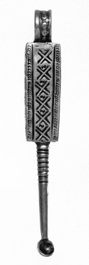 Amhara. <em>Pendant Cross with Ear Cleaner Extension</em>, 19th or 20th century. Silver, 3 x 1/2 in. (7.6 x 1.3 cm). Brooklyn Museum, Gift of George V. Corinaldi Jr., 79.72.5. Creative Commons-BY (Photo: Brooklyn Museum, 79.72.5_view1_bw.jpg)