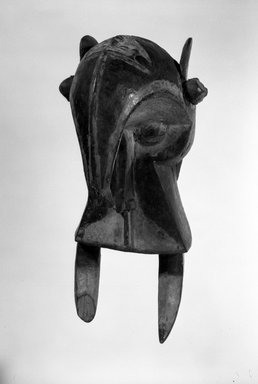 Igbo (northwest). <em>Horizontal Headdress in Elephant-Human Composite Form (Ogbodo Enyi)</em>, early 20th century. Wood, pigment, 21 x 9 1/2 x 11 1/2 in. (53.3 x 24.2 x 29.2 cm). Brooklyn Museum, Gift of Jay M. Haft, 80.243.16. Creative Commons-BY (Photo: Brooklyn Museum, 80.243.16_bw.jpg)