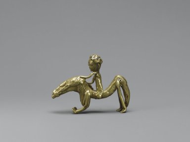 Akan. <em>Gold-weight (abrammuo): equestrian figure</em>, 19th century. Cast brass, 3 x 2 1/4 in. (7.6 x 5.7 cm). Brooklyn Museum, Gift of Mr. and Mrs. Arnold Syrop, 81.168.1. Creative Commons-BY (Photo: Brooklyn Museum, 81.168.1_PS6.jpg)