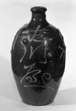  <em>Sake Bottle</em>, 19th century. Glazed stoneware; Tamba or Shigaraki ware, 12 3/4 x 7 in. (32.4 x 17.8 cm). Brooklyn Museum, Gift of William D. Stiehm, 81.205.3. Creative Commons-BY (Photo: Brooklyn Museum, 81.205.3_bw.jpg)