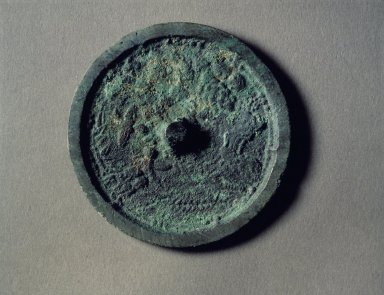  <em>Mirror</em>, 8th century. Bronze, Diameter: 3 1/16 in. (7.8 cm). Brooklyn Museum, Gift of Kaywin Lehman Smith, 81.207.4. Creative Commons-BY (Photo: Brooklyn Museum, 81.207.4.jpg)