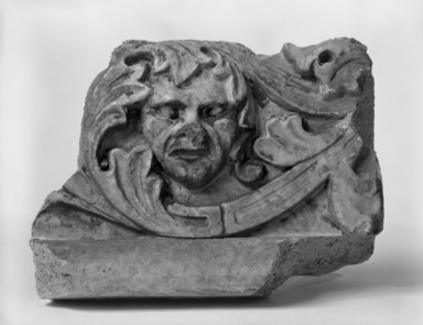 Unknown (American). <em>Foliate Border with Head, from Turner Towers, 135 Eastern Parkway, Brooklyn</em>, 1928. Cast Stone: cement composition and vitreous enamel, Other: 8 x 8 x 10 1/2 in. (20.3 x 20.3 x 26.7 cm). Brooklyn Museum, Gift of Charles Free, 81.209.11. Creative Commons-BY (Photo: Brooklyn Museum, 81.209.11_bw.jpg)