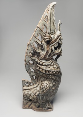  <em>Sawankhalok Roof Tile Finial</em>, 14th century. ceramic, overall: 21 1/6 x 7 11/16 x 8 1/4 in. (53.5 x 19.5 x 21 cm). Brooklyn Museum, Gift of Dr. Joel Canter, 81.278.1. Creative Commons-BY (Photo: Brooklyn Museum, 81.278.1_right_PS11.jpg)