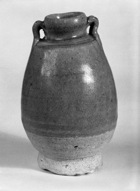  <em>Eared Jarlet</em>, 14th-15th century. Stoneware, 1 7/8 x 1 3/4 in. (4.8 x 4.4 cm). Brooklyn Museum, Gift of Dr. Jerome Krieger, 81.289.10. Creative Commons-BY (Photo: Brooklyn Museum, 81.289.10_cropped_bw.jpg)