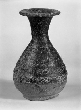  <em>Wine Bottle</em>, 13th-15th century. Stoneware, 5 3/4 x 3 1/2 in. (14.6 x 8.9 cm). Brooklyn Museum, Gift of Dr. Jerome Krieger, 81.289.16. Creative Commons-BY (Photo: Brooklyn Museum, 81.289.16_bw.jpg)
