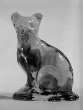  <em>Figure of a Cat</em>, ca. 1820. Glazed-earthenware, 3 1/2 x 2 3/4 x 1 3/4 in. (8.9 x 7 x 4.4 cm). Brooklyn Museum, Bequest of Dr. Grace McLean Abbate, 81.53.13. Creative Commons-BY (Photo: Brooklyn Museum, 81.53.13_cropped_bw.jpg)