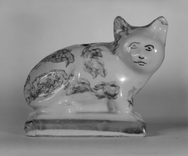  <em>Figure of a Cat</em>, Ca. 1700. Tin-glazed earthenware, 3 x 3 x 2 in. (7.6 x 7.6 x 5.1 cm). Brooklyn Museum, Bequest of Dr. Grace McLean Abbate, 81.53.5. Creative Commons-BY (Photo: Brooklyn Museum, 81.53.5_cropped_bw.jpg)