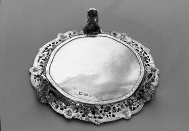 William Cripps. <em>Circular Waiter</em>, ca. 1752-1753. Silver, 1 1/2 x 7 1/4 x 7 1/4 in. (3.8 x 18.4 x 18.4 cm). Brooklyn Museum, Bequest of Donald S. Morrison, 81.54.27. Creative Commons-BY (Photo: Brooklyn Museum, 81.54.27_acetate_bw.jpg)