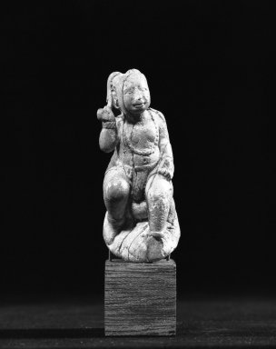  <em>Seated Figure</em>. Ivory, 2 3/8 x 1 in. (6 x 2.5 cm). Brooklyn Museum, Gift of Mrs. Nasli Heeramaneck, 82.121. Creative Commons-BY (Photo: Brooklyn Museum, 82.121_bw.jpg)