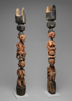 Yorùbá artist. <em>Figural post</em>, late 19th or early 20th century. Wood, pigment, 64 x 9 1/4 x 6 in. (162.6 x 23.5 x 15.2 cm). Brooklyn Museum, Gift of Allen A. Davis, 82.154.1. Creative Commons-BY (Photo: , 82.154.1_82.154.2_SL1.jpg)