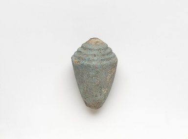  <em>Model Shell</em>, ca. 1836-1700 B.C.E. Faience, 1 3/16 x 1 7/8 in. (3 x 4.7 cm). Brooklyn Museum, Gift of Peter Sharrer, 82.170.2. Creative Commons-BY (Photo: , 82.170.2_PS9.jpg)