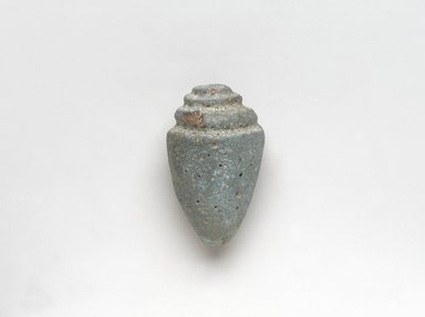  <em>Model Shell</em>, ca. 1836–1700 B.C.E. Faience, 1 3/16 x 1 7/8 in. (3 x 4.7 cm). Brooklyn Museum, Gift of Peter Sharrer, 82.170.3. Creative Commons-BY (Photo: , 82.170.3_PS9.jpg)