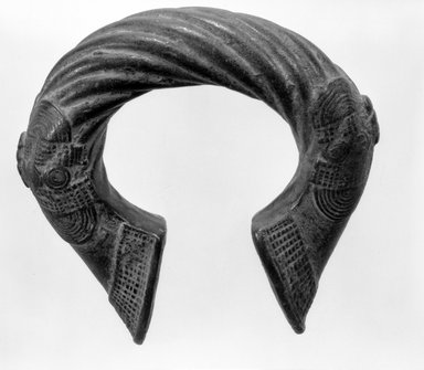 Possibly Lobi. <em>Bracelet</em>, late 19th-early 20th century. Copper alloy, 4 x 4in. (10.2 x 10.2cm). Brooklyn Museum, Gift of Mr. and Mrs. Arnold Syrop, 82.215.11. Creative Commons-BY (Photo: Brooklyn Museum, 82.215.11_bw.jpg)