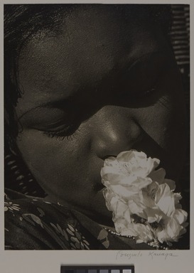 Consuelo Kanaga (American, 1894-1978). <em>Frances with a Flower</em>, early 1930s. Gelatin silver print, Image: 10 5/8 x 8 in. (27 x 20.3 cm). Brooklyn Museum, Gift of Wallace B. Putnam from the Estate of Consuelo Kanaga, 82.65.10 (Photo: Brooklyn Museum, 82.65.10_overall_PS20.jpg)