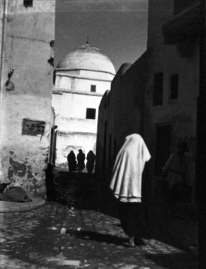 Consuelo Kanaga (American, 1894-1978). <em>[Untitled] (Women on a Street, Kairouan, North Africa)</em>, 1928. Negative, Negative: 3 1/16 x 4 1/8 in. (7.8 x 10.5 cm). Brooklyn Museum, Gift of Wallace B. Putnam from the Estate of Consuelo Kanaga, 82.65.2138 (Photo: Brooklyn Museum, 82.65.2138_bw_IMLS.jpg)