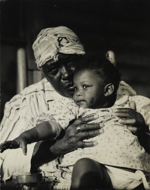Consuelo Kanaga (American, 1894-1978). <em>[Untitled] (Woman with Child, Tennessee)</em>, 1948-1950. Toned gelatin silver photograph, Image: 3 7/8 x 3 in. (9.8 x 7.6 cm). Brooklyn Museum, Gift of Wallace B. Putnam from the Estate of Consuelo Kanaga, 82.65.452 (Photo: Brooklyn Museum, 82.65.452_PS2.jpg)